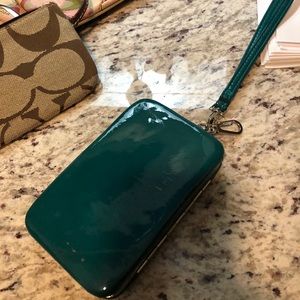 Teal colored women’s credit card case